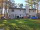 Backyard featuring grass, hot tub, above ground pool, and a fence at 6340 Koweta Rd, Fairburn, GA 30213