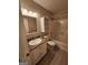 Bathroom featuring a vanity with granite countertop, a toilet, and a shower-tub combination with tile flooring at 6340 Koweta Rd, Fairburn, GA 30213
