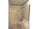Bright bathroom featuring a tub with shower, toilet, and vanity with sink at 2958 Mary Alice Trl, Loganville, GA 30052