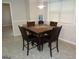 Nice dining area featuring a wooden table with chairs and a water cooler at 2958 Mary Alice Trl, Loganville, GA 30052