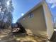 Charming outdoor space with a wooden deck and stairs, perfect for relaxation at 6205 Littleton Dr, Union City, GA 30291
