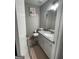 This bathroom has granite countertops and modern lighting at 6205 Littleton Dr, Union City, GA 30291