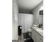 The bathroom has granite countertops, wood floors, and a shower at 6205 Littleton Dr, Union City, GA 30291