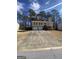 Inviting two-story home with a two-car garage and a spacious driveway at 6205 Littleton Dr, Union City, GA 30291