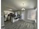 Bright kitchen with stainless steel appliances, a center island, and eat-in dining area at 6205 Littleton Dr, Union City, GA 30291