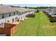 An aerial view of a neighborhood with green grass and townhomes at 695 Georgetown Ct, Jonesboro, GA 30236