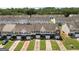An aerial view of a neighborhood with townhomes and driveways at 695 Georgetown Ct, Jonesboro, GA 30236