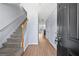 Inviting foyer with hardwood floors and a staircase leading to the upper level at 695 Georgetown Ct, Jonesboro, GA 30236