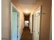 Hallway with doors, providing a sense of privacy and separation between rooms at 270 Mountain Way, Covington, GA 30016