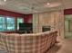 Finished basement offers a comfortable seating area, a fireplace, and natural light, making it ideal for relaxation at 307 Worthing Ln, Mcdonough, GA 30253