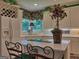 Bright kitchen with white cabinetry, a center island, and stainless steel appliances at 307 Worthing Ln, Mcdonough, GA 30253