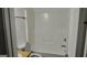 Clean and functional full bathroom with white fixtures, including a shower/tub combo and toilet at 1581 Jersey Social Circle Rd, Covington, GA 30014