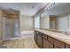 Bathroom offers a double vanity, tiled floors, shower, and soaking tub for relaxation at 2093 Parador Bnd, Mcdonough, GA 30253