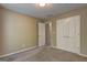 Bedroom showcasing neutral walls, plush carpeting, and a spacious closet at 2093 Parador Bnd, Mcdonough, GA 30253