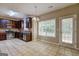 Well-lit kitchen with stainless steel appliances, granite countertops, and a large window at 2093 Parador Bnd, Mcdonough, GA 30253