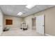 Basement exercise area featuring carpeted floors and a ceiling fan, great for workouts at 285 Spear Rd, Peachtree City, GA 30269