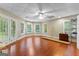 Basement area featuring hardwood flooring, abundant natural light and backyard access at 285 Spear Rd, Peachtree City, GA 30269