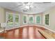 Basement area featuring hardwood flooring, abundant natural light and backyard access at 285 Spear Rd, Peachtree City, GA 30269