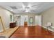 The finished basement has hardwood flooring, offering versatility for various activities at 285 Spear Rd, Peachtree City, GA 30269