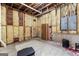 Unfinished basement with exposed insulation and utilities, offering customization potential at 285 Spear Rd, Peachtree City, GA 30269