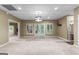 The bonus room features carpet floors, recessed lights, and double doors at 285 Spear Rd, Peachtree City, GA 30269