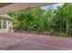 Large, stained deck overlooks a lush backyard, great for entertaining or enjoying peaceful outdoor moments at 285 Spear Rd, Peachtree City, GA 30269