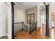 This hallway features hardwood floors and natural light at 285 Spear Rd, Peachtree City, GA 30269