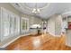 Bright, airy living space with a built-in desk, custom cabinetry and plantation shutters at 285 Spear Rd, Peachtree City, GA 30269