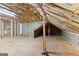 Spacious unfinished attic with exposed insulation at 285 Spear Rd, Peachtree City, GA 30269