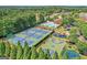 Extensive Community amenities including pool, tennis courts, basketball court, playground, and lush landscaping at 910 Pebble Creek Trl, Suwanee, GA 30024