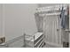Walk-in closet with clothes rack, shelves and a bonus storage room for maximum storage solutions at 33 Vinery Ct, Sharpsburg, GA 30277