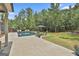 An inviting backyard features a pool, sun loungers, and a lush lawn, perfect for outdoor relaxation and entertainment at 33 Vinery Ct, Sharpsburg, GA 30277