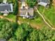Overhead shot of a property showing the backyard, fencing, and proximity to neighboring houses at 1132 Hargrove Ct, Locust Grove, GA 30248