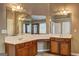 Primary bathroom vanity with dual sinks, ample countertop space and a large mirror at 1132 Hargrove Ct, Locust Grove, GA 30248