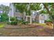 Traditional two-story home featuring an attached two-car garage and mature landscaping at 1132 Hargrove Ct, Locust Grove, GA 30248
