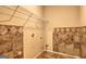 Spacious laundry room featuring tile accents, utility hookups, and ample storage space at 1132 Hargrove Ct, Locust Grove, GA 30248
