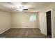 Neutral bedroom with carpet floors, a window, and a closet at 3158 Wisteria Way, East Point, GA 30344