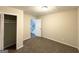 Bedroom with wall-to-wall carpet, neutral paint, and closet at 3158 Wisteria Way, East Point, GA 30344