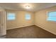Bright bedroom with carpet and two windows at 3158 Wisteria Way, East Point, GA 30344