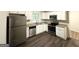 Modern kitchen equipped with stainless steel appliances and granite countertops at 3158 Wisteria Way, East Point, GA 30344