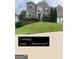 Charming two-story brick home with manicured landscaping and a welcoming front entrance at 3717 Shady Maple Dr, Stonecrest, GA 30038
