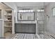 Luxury main bathroom with a double vanity, a large walk-in closet and a glass enclosed shower at 505 Bracken Edge, Peachtree City, GA 30269