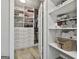 Custom walk-in closet with built-in shelving, drawers and ample storage at 505 Bracken Edge, Peachtree City, GA 30269