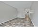 A spacious living room with hard wood floors that opens to a bathroom and vanity at 292 Twiggs Cor, Peachtree City, GA 30269