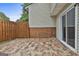 Cozy outdoor patio featuring decorative flooring and a wood privacy fence at 292 Twiggs Cor, Peachtree City, GA 30269
