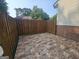Cozy patio space with decorative stone flooring and wood fencing offers a private outdoor retreat at 292 Twiggs Cor, Peachtree City, GA 30269