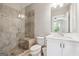Bathroom with a glass shower and a light wood bench, and a modern countertop at 1685 Tabor Dr, Marietta, GA 30062