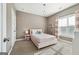 Cozy bedroom with a pink bed frame, carpet floors, and lots of natural light at 1685 Tabor Dr, Marietta, GA 30062