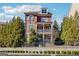Charming three-story home featuring a covered porch and well-maintained landscaping at 1685 Tabor Dr, Marietta, GA 30062