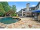 Spacious backyard featuring a custom pool, hot tub, patio and gazebo at 4030 River Ridge Chase Se, Marietta, GA 30067